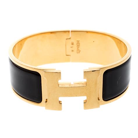 hermes enamel bangle watch|hermes black and gold bracelet.